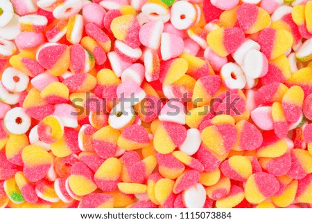 Assorted gummy candies. Top view. 