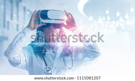 Medical technology concept. Mixed media. Female doctor wearing virtual reality glasses. Checking brain testing result with simulator interface, Innovative technology in science and medicine.
