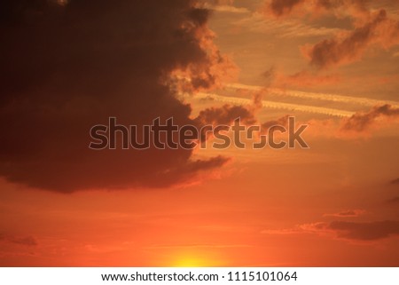 Clouds in the sky at sunset as background .
