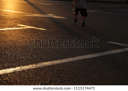 image of empty parking lot during sunset. asphalt background