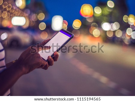 Young woman using smart phone,Social media concept / soft focus picture / Vintage concept

