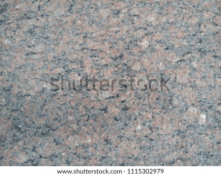 Gray wall. Large stone slabs. Granite. The background.