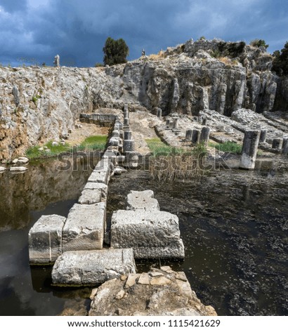 Ancient Greece, ruins of the harbor in town Oiniades Royalty-Free Stock Photo #1115421629