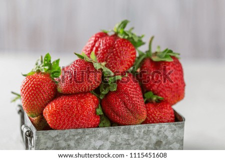 Fresh juicy strawberries with leaves. Strawberry background. Healthy food concept. Fresh organic berries