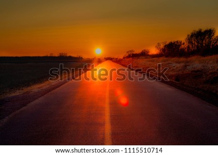 Sunset on endless road