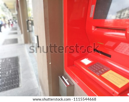 Milan,Italy-June 2018: Red ATM Automatic Teller Machine in the Street for Cash Withdrawal
