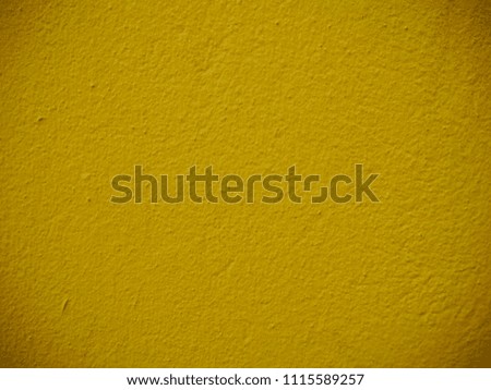 Textured, relief yellow wall, background with space for text, copyspace