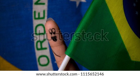 Fingers celebrating Brazil