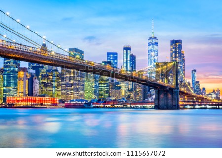 Brooklyn Bridge and the Lower Manhattan skyline at dusk