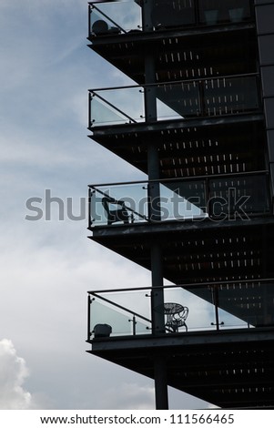 Silhouetted balconies on a modern residential building