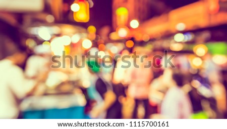 Abstract Blurred image of Street night  light bokeh for background usage. (vintage tone)