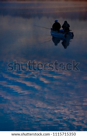 Fishing at sunrise, Pinehurst, North Carolina Royalty-Free Stock Photo #1115715350