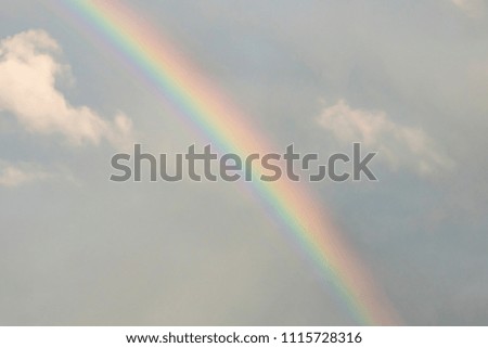clouds in the blue sky and rainbow