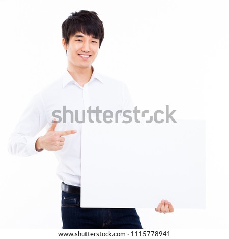 Young Asian man showing a pannel card isolated on white background. 