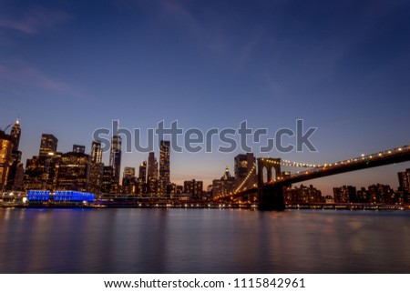 The Manhattan skyline at dusk seen from Brooklyn. 