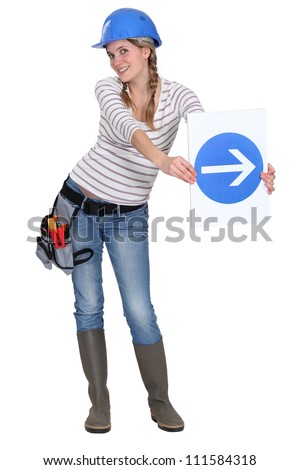 Woman with a one way sign