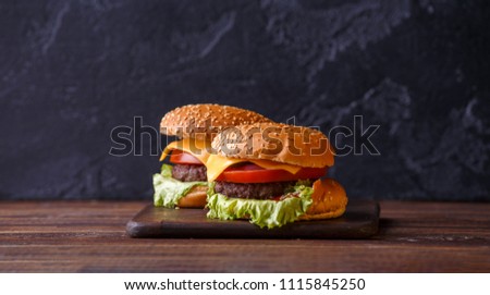 Photo of two fresh hamburgers