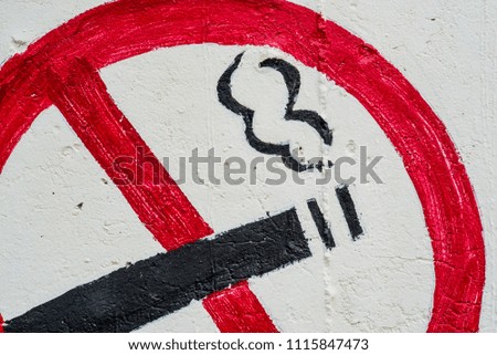 Non smoking sign in wall.