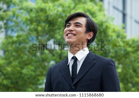 Japanese young businessman Royalty-Free Stock Photo #1115868680