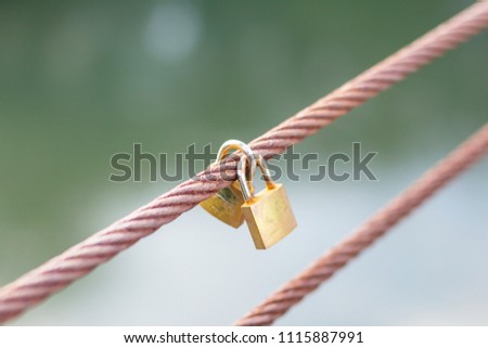 Locked key on rope bridge together forever, Valentine Day