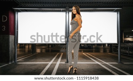 Slim young woman and advertising banner of free space for your decoration. 