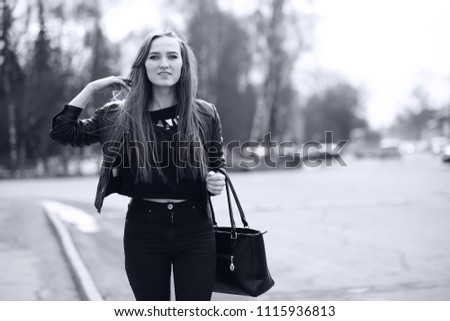 Toned picture of a young cute girl on a walk