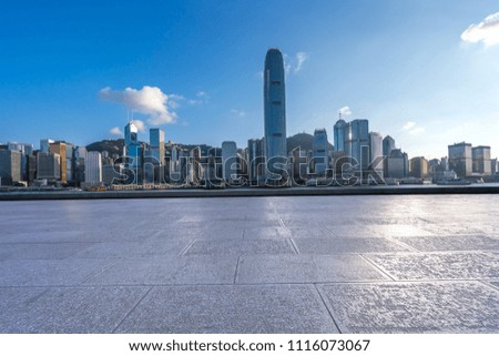 empty square with city skyline in hongkong china