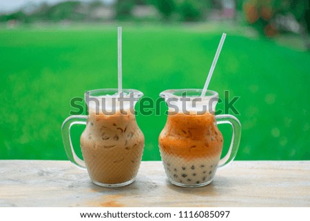 bubble tea and coffee at rice field