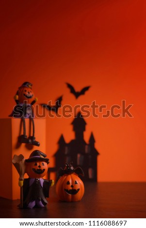 Halloween pumpkins jack-o-lantern on orange background. Happy Halloween concept. 