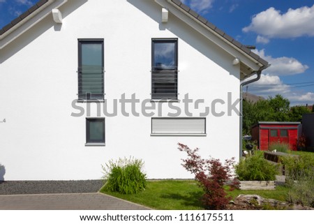 modern house architecture in rural countryside at springtime in south germany near city stuttgart