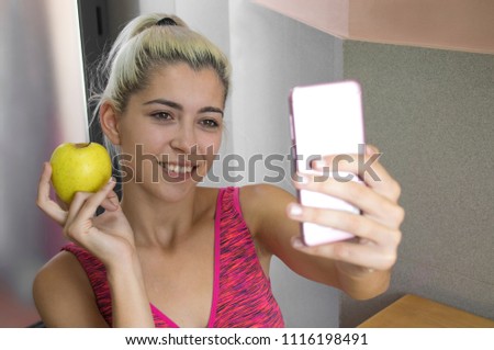 young girl selfie with an apple