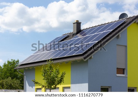 solar panel on rooftop of south german rural village at springtime near city of stuttgart Royalty-Free Stock Photo #1116270779