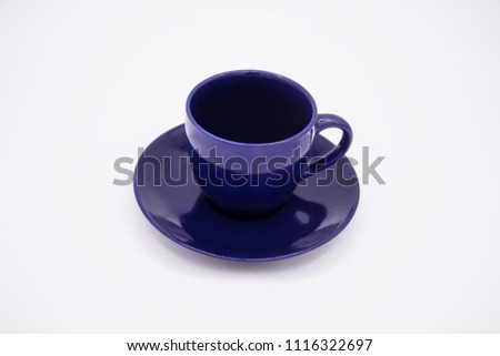 dark blue cup on the plate