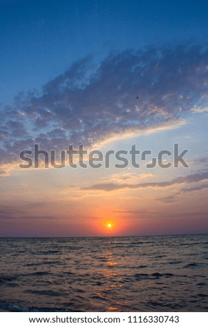 sunrise over the ocean,Early morning, sunrise over sea beautiful photo vertical