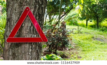 triangle sign at tree