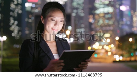 Businesswoman use of tablet computer
