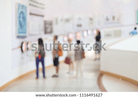 Blurred of People are watching the exhibition