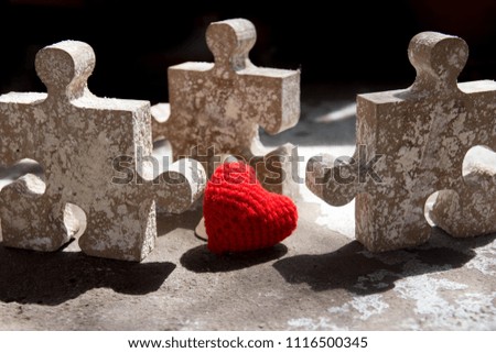 Red heart and wooden jigsaw puzzle piece,Business,Love concept