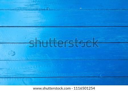 wood blue texture background, light weathered rustic oak. faded wooden varnished paint showing woodgrain texture. hardwood washed planks pattern table top view