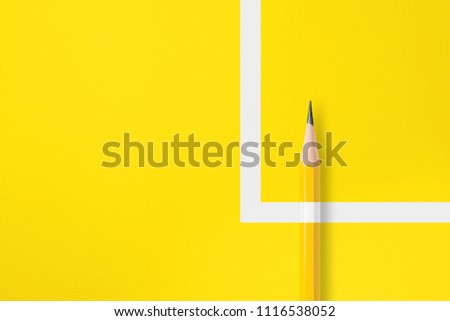 Minimalist presentation template with copy space by close up photo of yellow pencil isolated on yellow paper and combine with white line right angle. Flashlight made smooth lighting on yellow pencil. Royalty-Free Stock Photo #1116538052