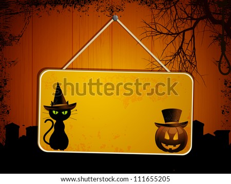 Halloween sign with black cat and pumpkin on a wooden background