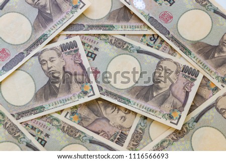 Image of income and expenditure. Translation: "Bank of Japan Tickets" "One hundred thousand yen" "The Bank of Japan" by Koji Yamamoto