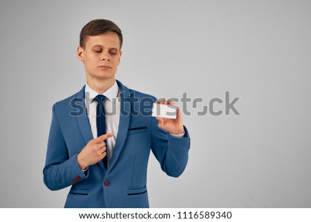 business man with a white cardboard in his hand                             