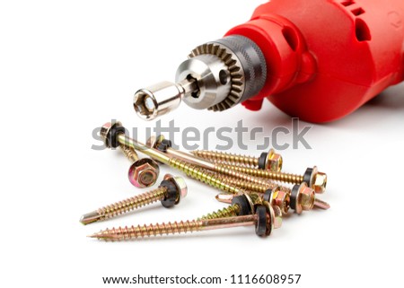 Close up HEX Drive magnetic drill bit socket driver (8mm) for roof screw install with red electric drill isolated on white background.
