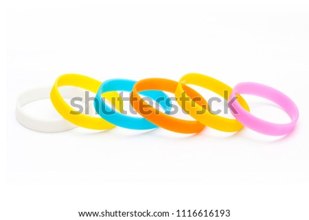 Colored latex glowing light-bracket bracelet on white Background. Multicolor set