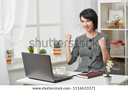 portrait of a business woman in a white interior