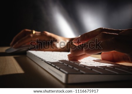 close up hand using laptop.