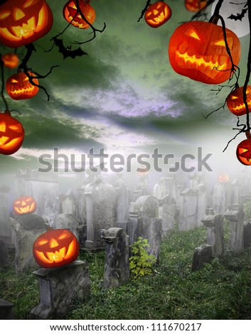 Spooky halloween pumpkins on cemetery