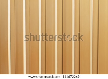 Industrial aluminum wall with rusty nails background