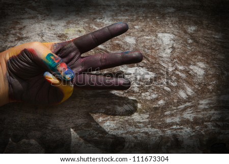 hand with color painting sign symbol seem number